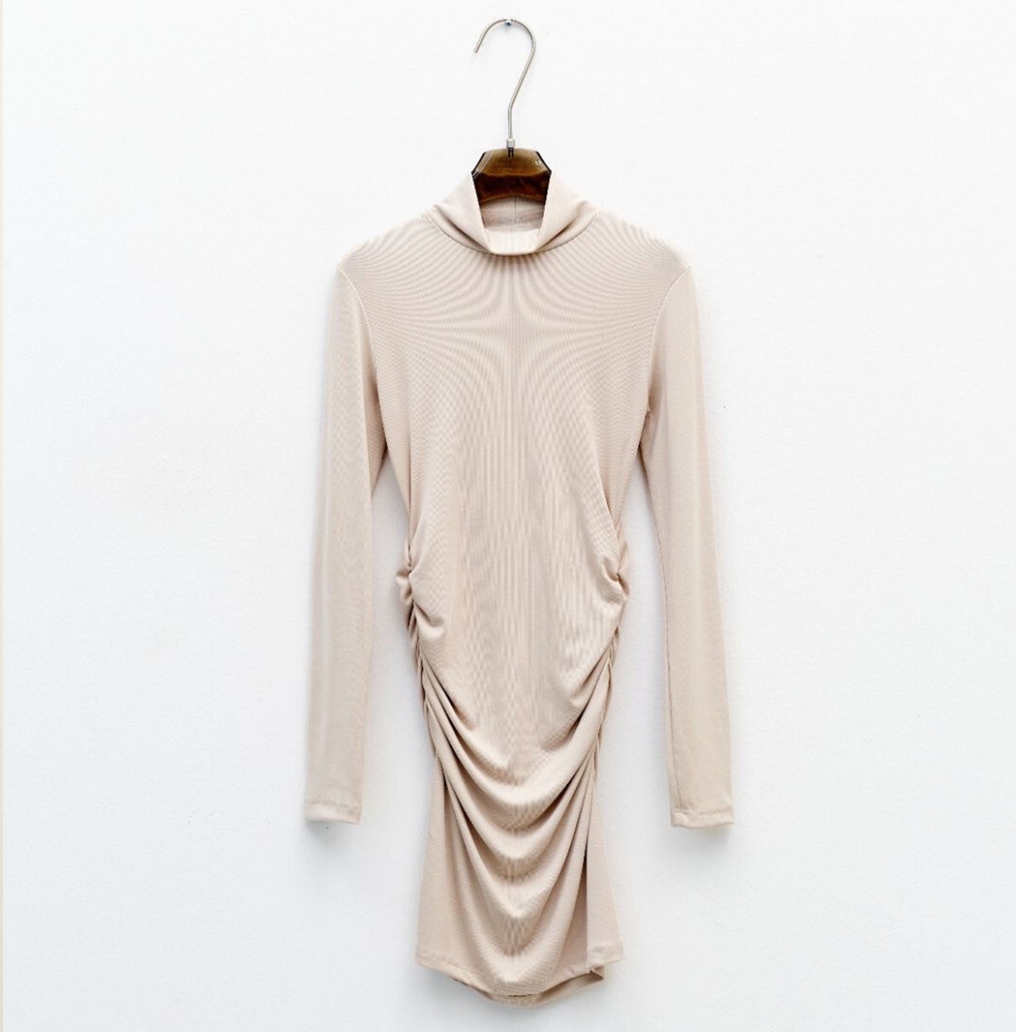 beige knitted dress, high neck, fitted, long sleeves, party look, draped