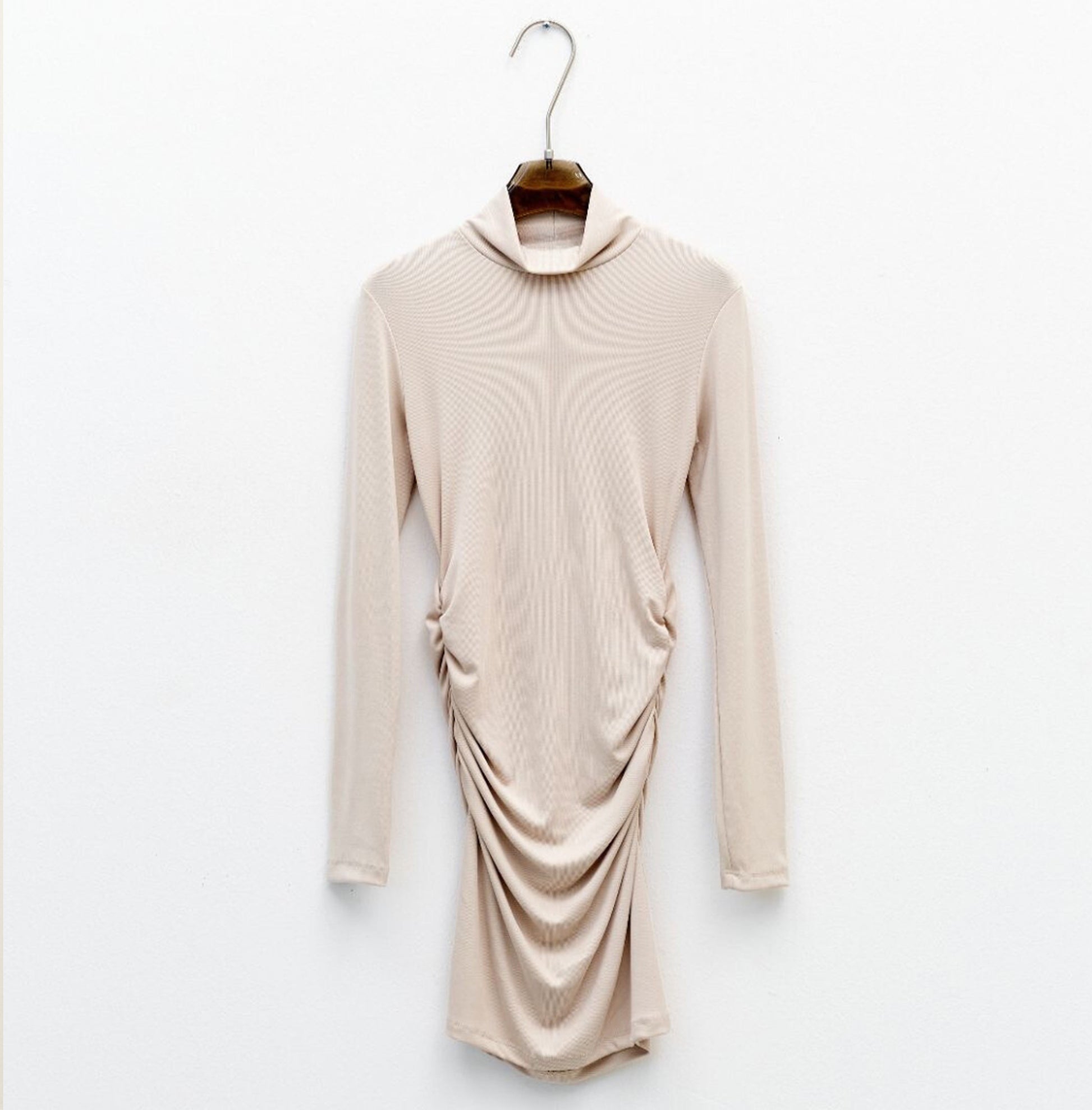 beige knitted dress, high neck, fitted, long sleeves, party look, draped